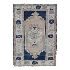 Vintage Hand Knotted Turkish Oushak Rug With Stylized Medallion in Midnight Blue and Cream