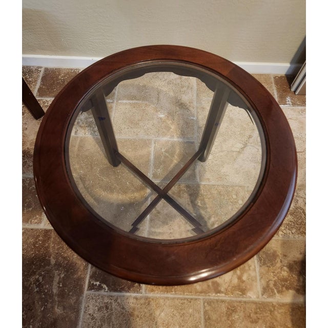This elegant round accent table introduces a beautiful geometric contrast to rectangular pieces. The circular top features...