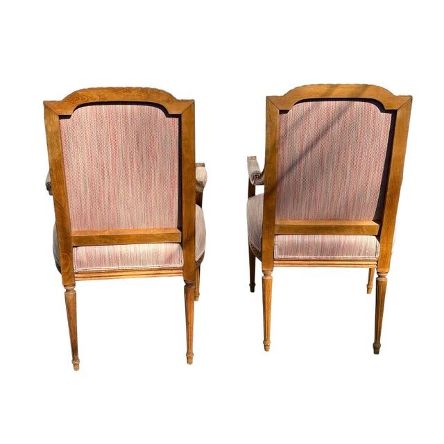Stunning set of French Louis XVI arm chairs upholstered in a pink and green fabric. Beautiful carved details - acanthus...