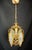 Vintage 1960s brass chandelier with its original finish, elegant floral details and classic European design....