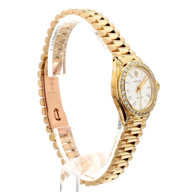 Vintage Rolex Precision manual-wind watch in 18K yellow gold featuring a 22mm round case with aftermarket diamond bezel...