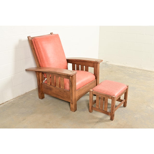 An exceptional Mission or Arts & Crafts style bow arm Morris reclining lounge chair with ottoman By L. & J.G. Stickley...