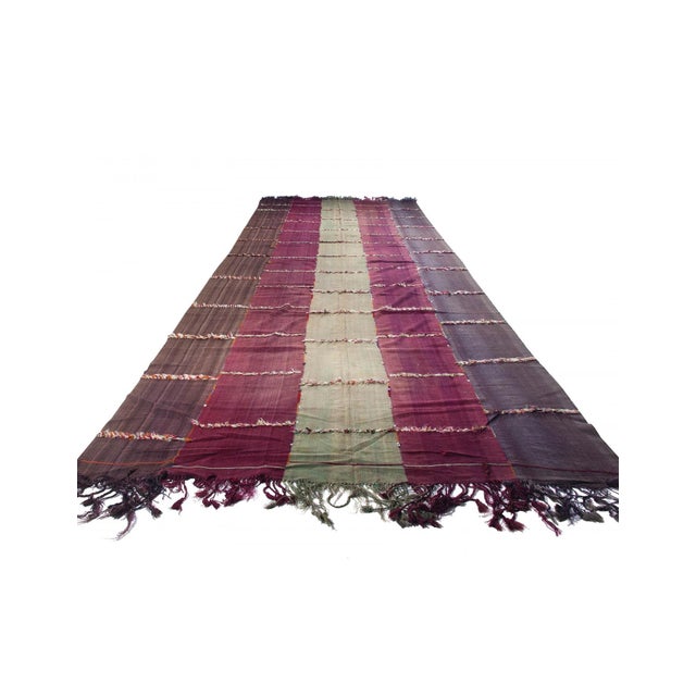 Vintage oversized handwoven decorative kilim rug from Malatya region of Turkey. Approximately 70-80 years old. In very...