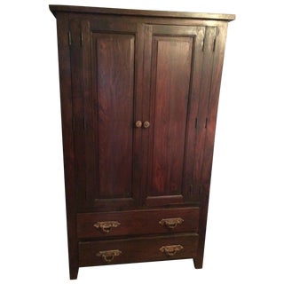 Eastern Rustic Dark Brown Wood Armoire For Sale