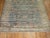 A mid 20th Century room size Turkish Rug with an all-over large scale design on a green field. Accents in cream and...