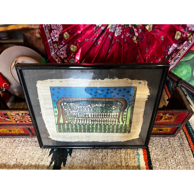 Up for consideration is a beautiful vintage Egyptian hieroglyphs artwork in a black frame. This would look lovely in your...