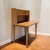 Mid Century Laminate Desk with Hutch and Bookshelf. A compact mid-century laminate desk with an integrated hutch and open...