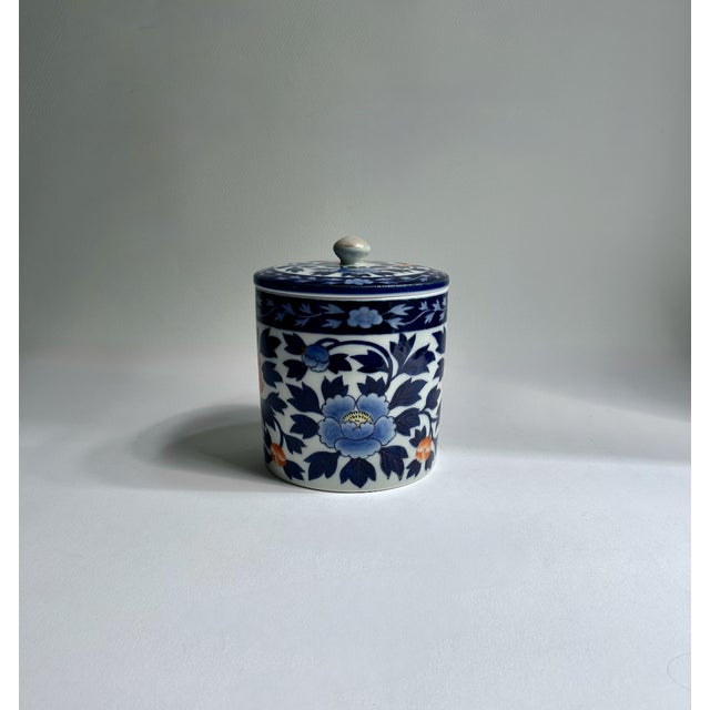 Early 20th C. Fukagawa Koransha lidded White Porcelain Canister with Blue and Coral Peonies. Featuring a reflective White...