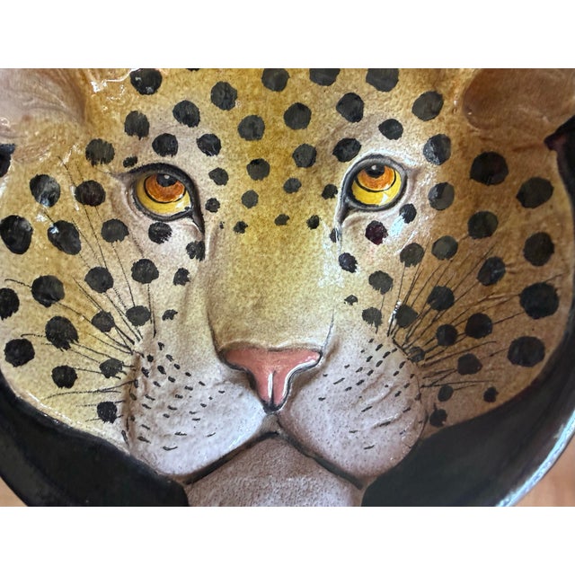 This is a Hollywood Regency Era Italian terracotta leopard bowl or plate. The edges are curved slightly. It has a vivid...