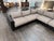 Design Plus Gallery presents a Modernist Three Piece Bespoke Sectional Sofa. In a gray woven fabric upholstery and black...