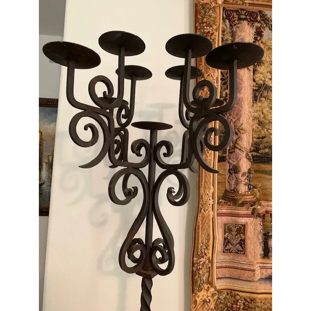Make a bold statement with this pair of towering Emmanuel Design Group floor candelabras, expertly crafted from hand-...