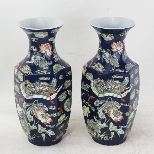 This stunning pair of mid-century Chinese Famille Rose vases features a distinctive hexagonal faceted form, meticulously...