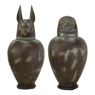 A Pair of Exquisite Vintage Hand-Forged Tin Canopy Jars Duamutf (Jackal) and Kebekhsenuf (Falcon) For Sale