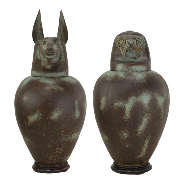 A Pair of Exquisite Vintage Hand-Forged Tin Canopy Jars Duamutf (Jackal) and Kebekhsenuf (Falcon) For Sale