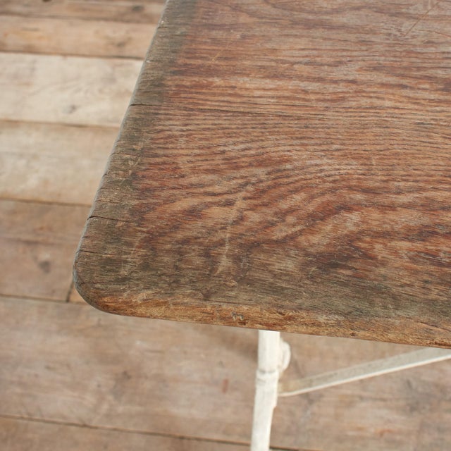 Antique French Wrought Iron Garden Bistro Table with Wooden Top, 1920s For Sale - Image 6 of 10