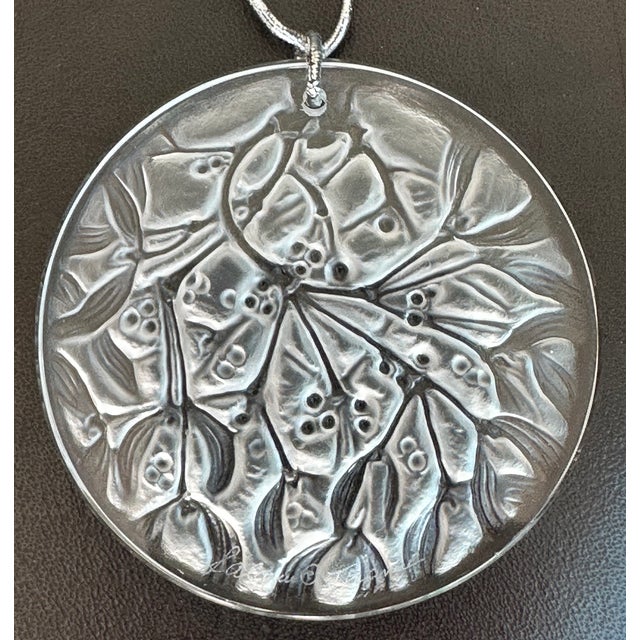 Vintage Lalique mistletoe French crystal ornament in the excellent condition. The last photo shows another one with a red...