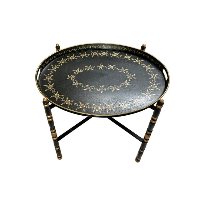 Add timeless style and versatile function to your home with this lovely pair of oval tole tray tables. Featuring removable...