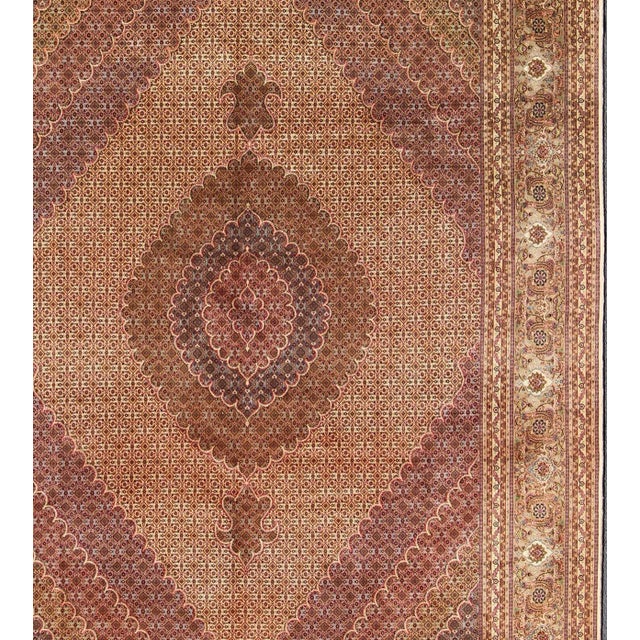 Measures: 9'9 x 13'. Vintage Persian Tabriz Rug with Diamond Medallion Design in Rich Burgundy. Keivan Woven Arts / rug...