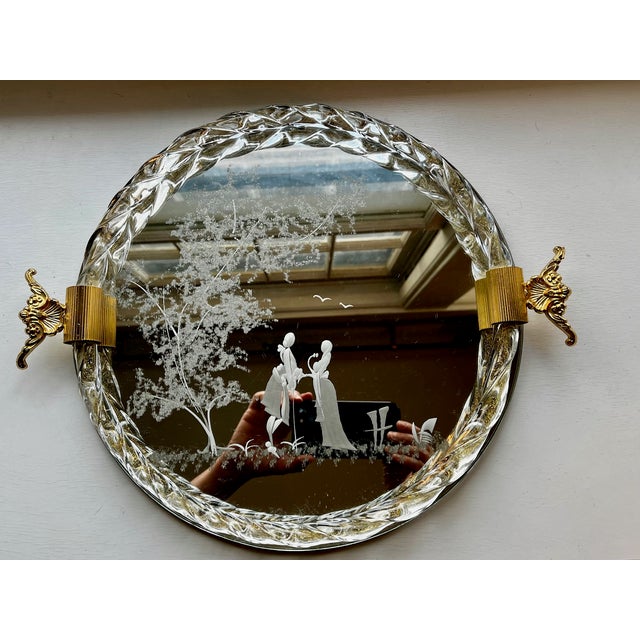 1940s vintage Italian etched Murano style glass tray with a classic scene motif. The edge of the tray features a gold...