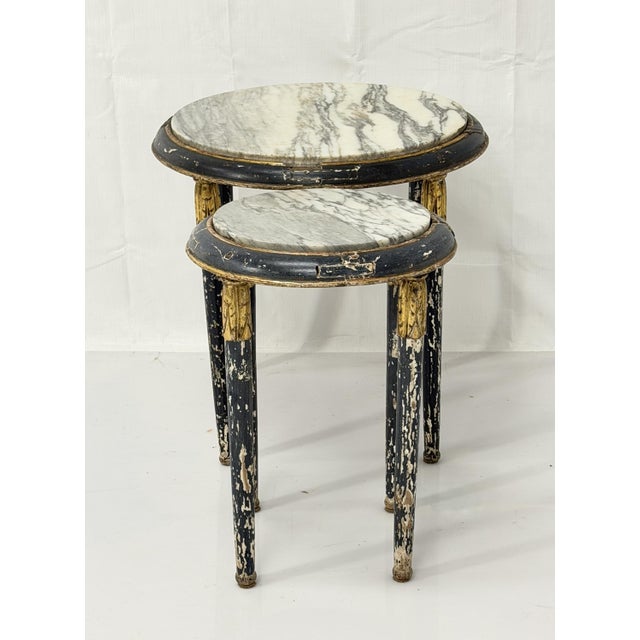 A charming and highly decorative set of two French Louis XVI-style circular guéridon or occasional tables, dating to the...
