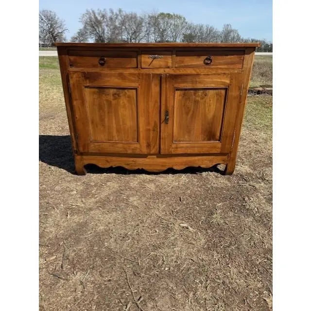 18th Century French country Louis XV Solid Walnut sideboard made of solid walnut the wood has been finished with a...