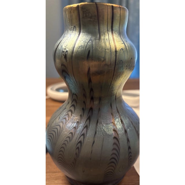 An exquisite and rare Austrian Art Nouveau iridescent art glass vase by Joh. Loetz Witwe, circa 1900. Executed in the...