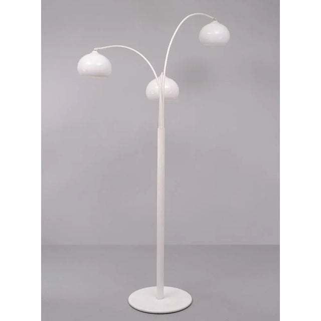 Very nice Three acrylic glass shades floor lamp with large round base. The shades can be moved side ways to direct the...