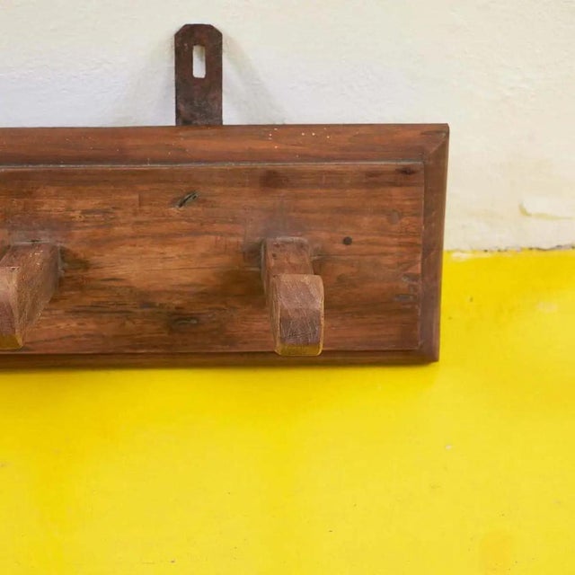 Solid Wood Coat Stand, 1950s, in Good conditions. Designed 1980 to 1989 This piece is attributed to the mentioned...