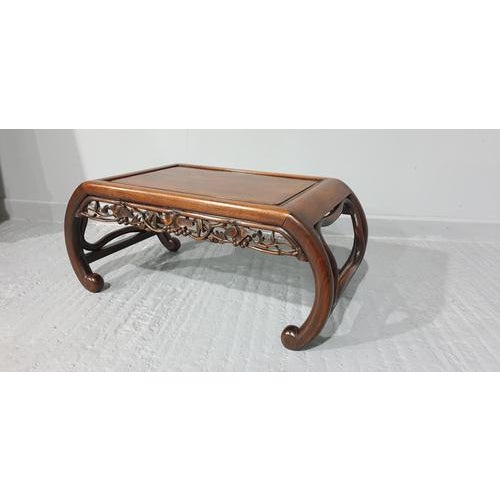 This is a lovely example of a padauk wood oriental opium coffee table with pierced sides, excellent colour and condition.