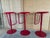 A striking design where a single bent steel tube forms the entire structure — cradling the seat and doubling as an...