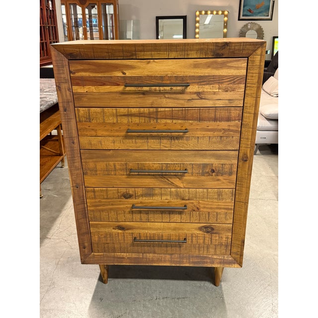 Design Plus Gallery presents the Alexa Reclaimed Wood Tall Dresser from West Elm. The dresser is constructed from...