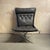 High back dark brown vintage leather Falcon chair designed by Sigurd Resell in chrome. In good vintage condition. There is...