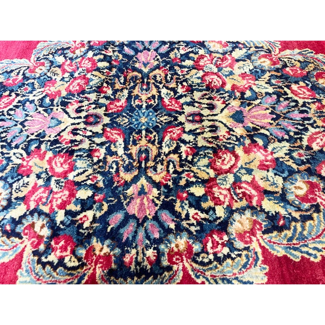 This elegant antique Persian Laver Kerman, woven circa 1920, is an outstanding example of the refined artistry for which...