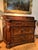 This magnificent italian 17th-century solid walnut chest of drawers (canterano), is a testament to the craftsmanship of...