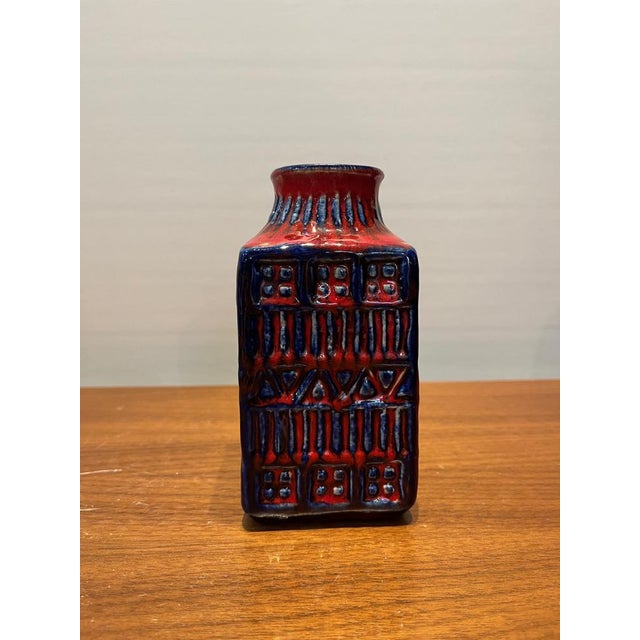 This is a classic must-have for any West Germany pottery collector. This beautiful vase was produced in the second half of...