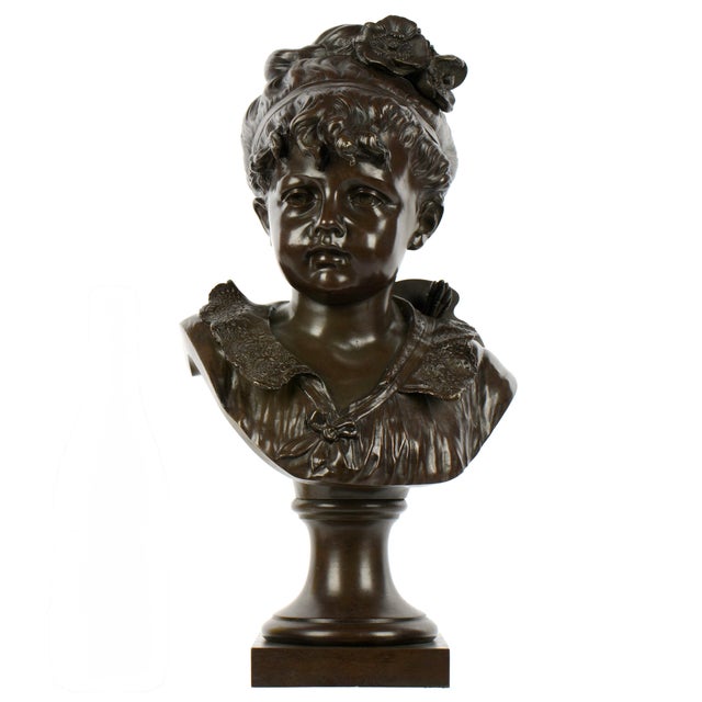 Patinated Bronze Bust of a Young Girl by Alfred Rolle (American/Russian, b.1816). This sculpture portrays a youthful girl...