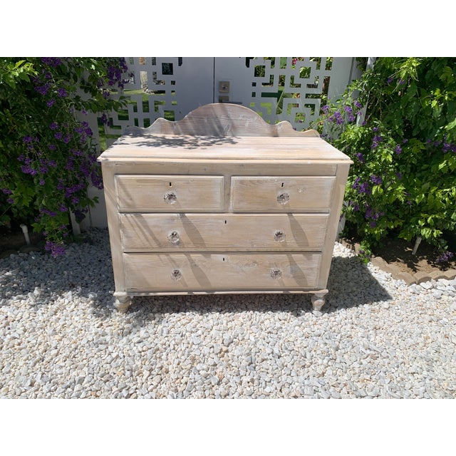 Here we have a lovely antique English pine chest of drawers. Two smaller drawers over two large. Lots of patina and plenty...