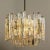 This modern chrome brushed chandeliers, manufactured by Kalmar Austria in the 1970s, have eight E27 sockets and three...