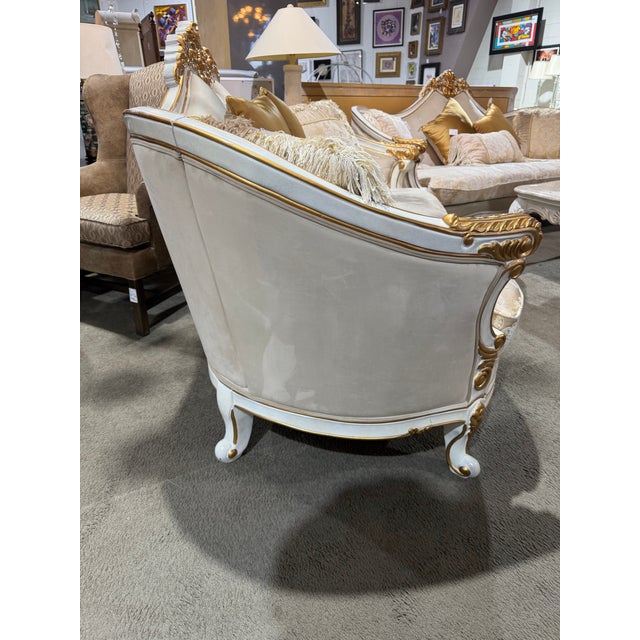 Opulent and richly detailed, the Homey Design Mazie loveseat embodies classic European elegance with dramatic presence and...