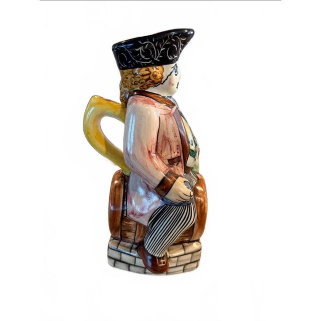 Bring a touch of whimsical European folk art to your bar cart or ceramic collection with this charming hand-painted...