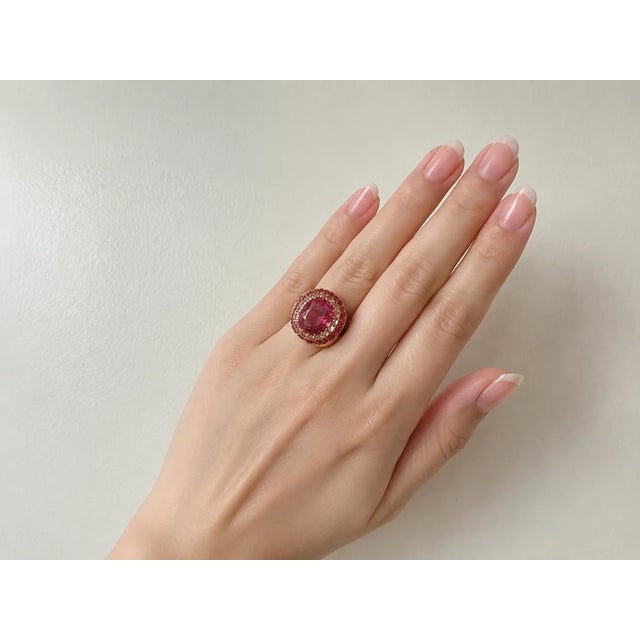 14K white gold bold designer ring featuring a round amethyst center stone, surrounded by 0.50 carats of white sapphires...