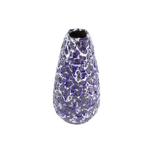 A West German ceramic vase produced by ES Keramik. This mid-century vase is teardrop shaped and has a blue, black, and...