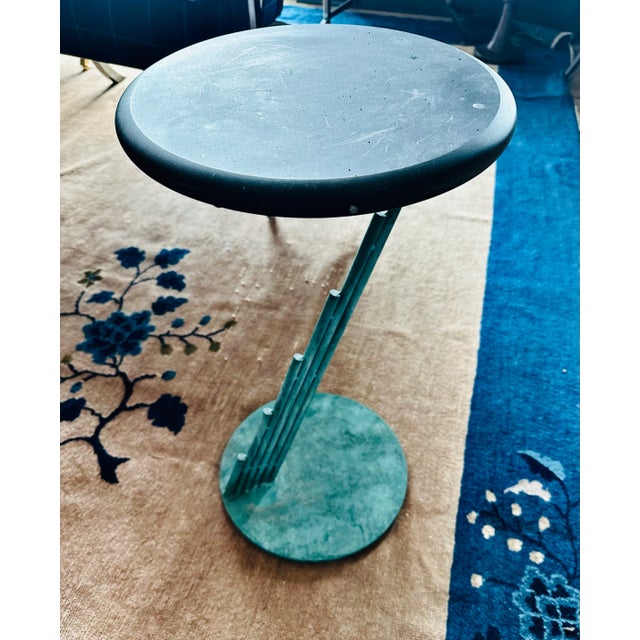 Fabulous Postmodern accent/occasional table that is both utilitarian and striking as a sculptural element. Round honed...