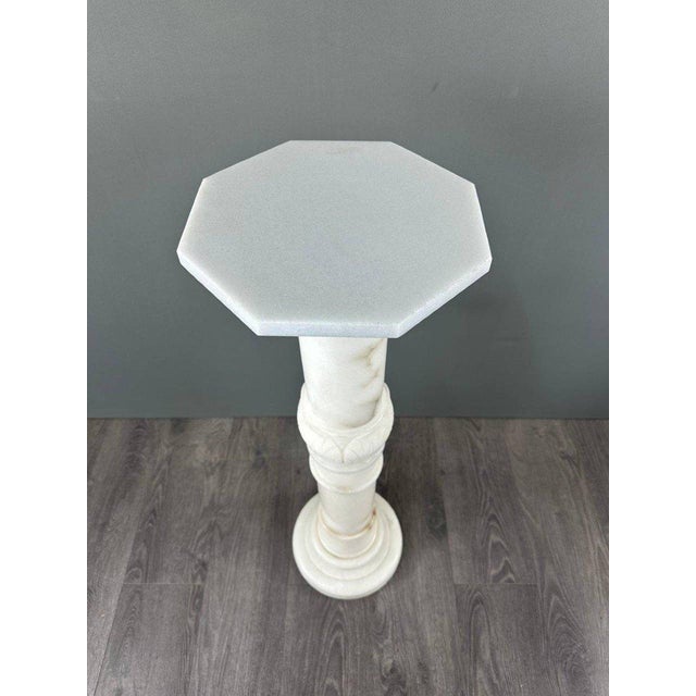 Carved White Marble Column, Mid-20th Century A stunning white marble column dating from the mid-20th century. with its...