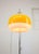 Rare specimen in yellow colour. Adjustable height of the shade. Long electric cable. Two e14 light bulbs (not included)....