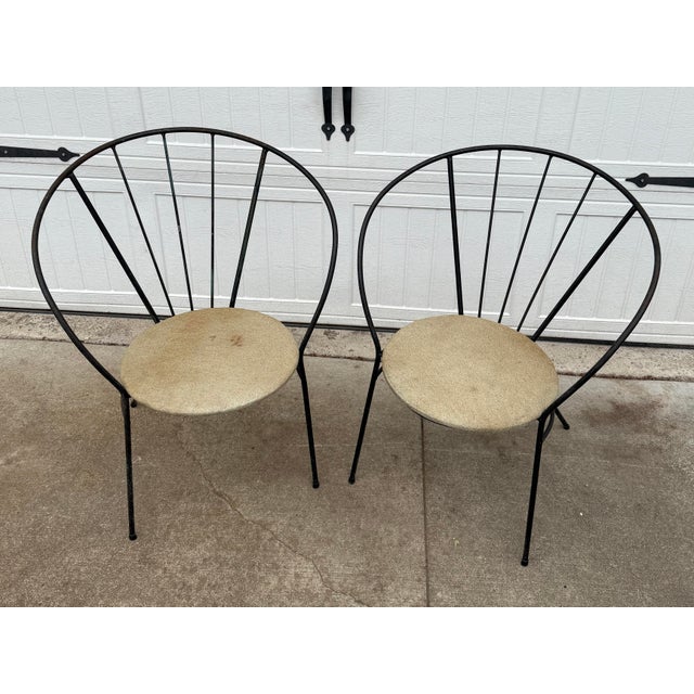 Great pair of Mid-Century Modern wrought-iron hoop chairs. Would be great inside or out. Features the original upholstery...