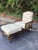 A handsome vintage McGuire lounge chair and matching ottoman, newly upholstered in a softly textured, pale yellow and...