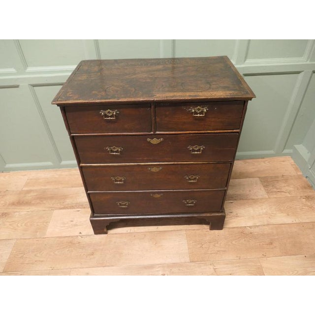 Late 18th Century Georgian Period Oak Chest of Drawers This Charming Old Oak Chest of Drawers is full of naive character...