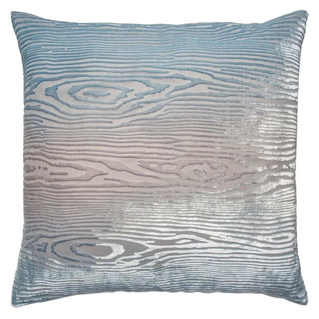 A serene study in restraint, this 20-inch pillow marries the organic warmth of natural woodgrain with the cool,...