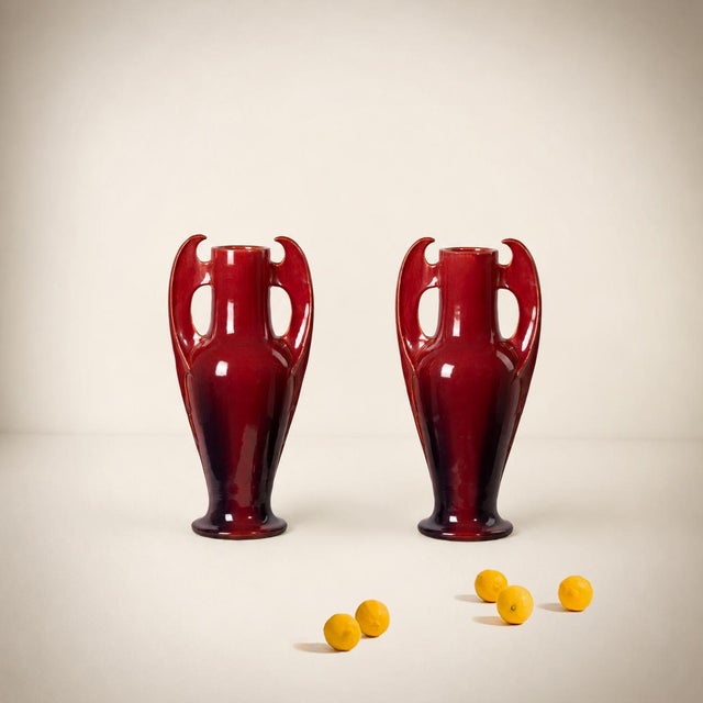 Art Nouveau Oxblood Enameled Ceramic Vases, France, 1900, Set of 2, in Good conditions. Designed 1890 to 1919 This piece...